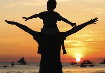 father and son having fun on sunset Law Office of Marc Andrew Moses